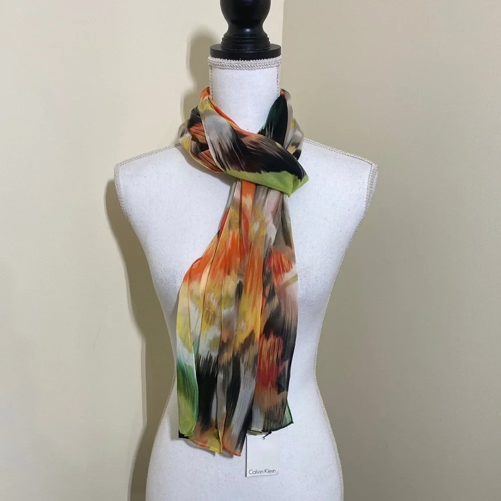 NWT Calvin Klein || woman’s multicolor scarf .L70”W14”